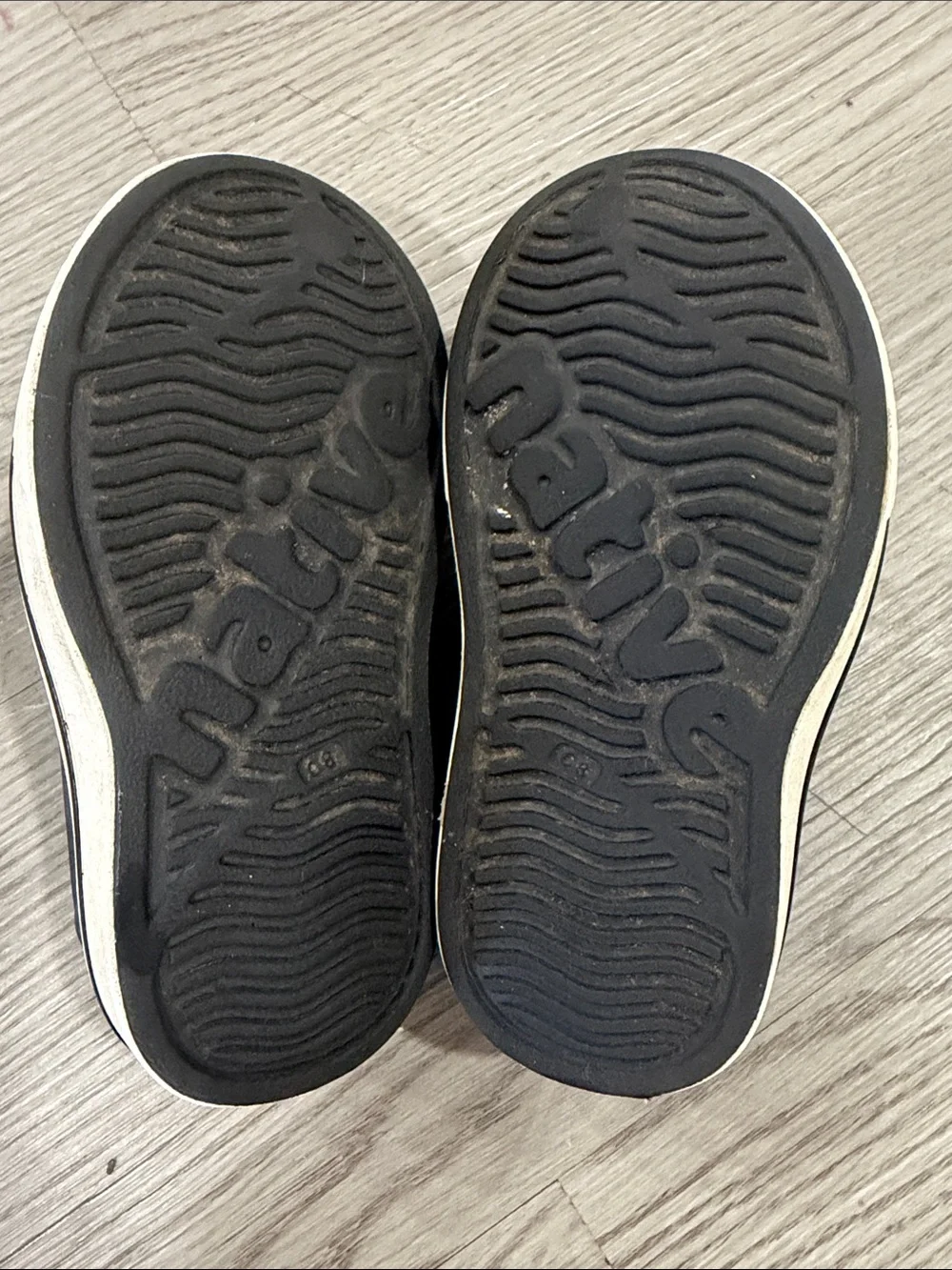 Native Black Perforated Slip-On Loafers with Off-White Trim Toddler C8